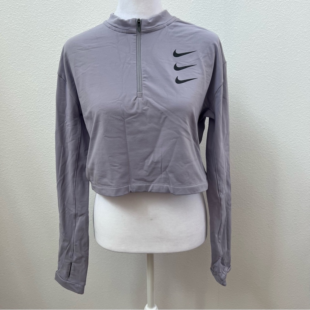 Nike Swoosh Women's Dri-FIT 1/2 Zip Running Mid Layer in light purple/grey color